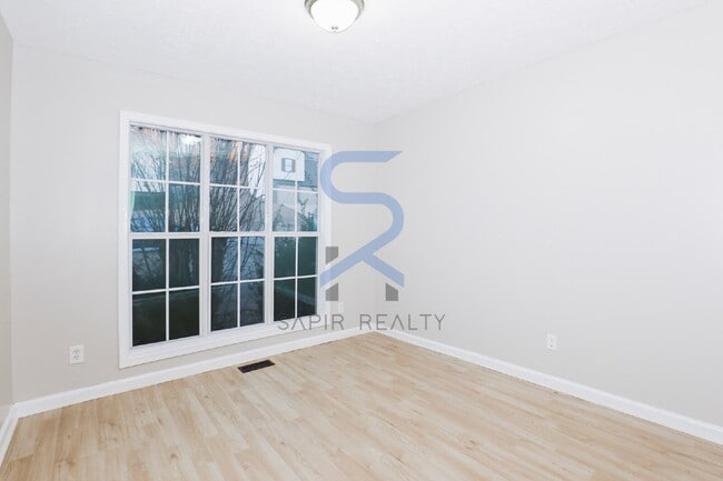 Building Photo - Move in before February 15th and choose your reward: a $250 Amazon Gift Card or a 55" Smart TV!