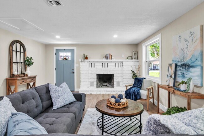 Building Photo - A spacious 3-bedroom, 2-bath layout provides plenty of room for family and guests!