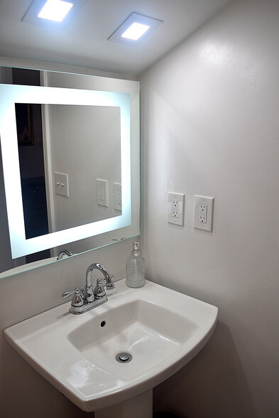 Sink, Lighted Mirror - 229 N Poplar St