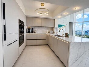 Building Photo - 16699 Collins Ave