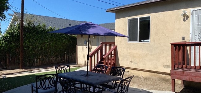 Building Photo - 5BR/2BA with Private Yard!
