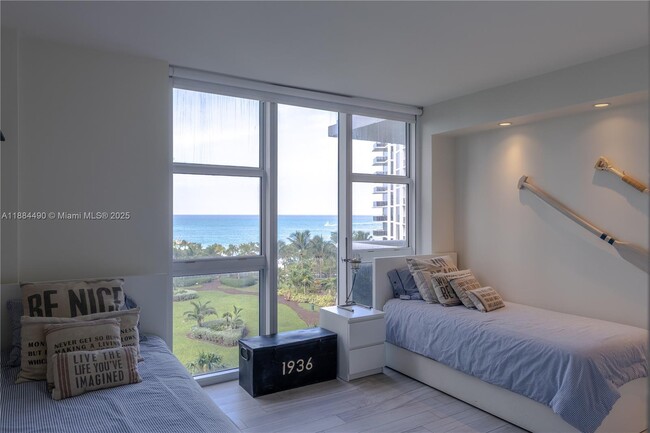 Building Photo - 10275 Collins Ave