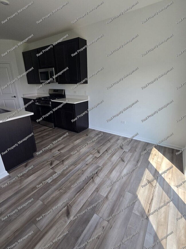Building Photo - New Construction 3 Bedroom Townhome