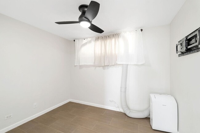 Building Photo - Experience Island Living at Its Finest in ...
