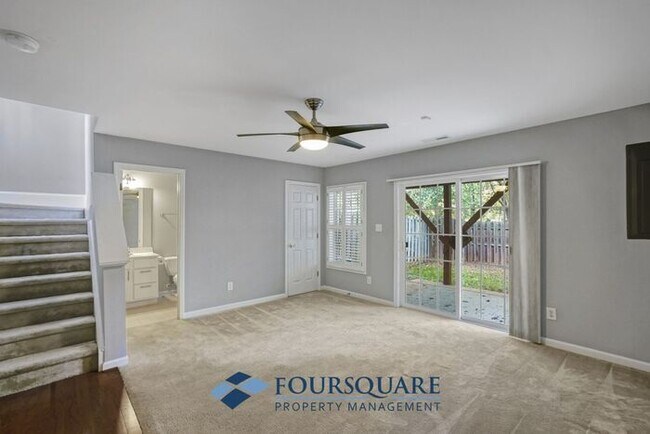 Building Photo - Lakefront Townhome with 1st Floor Bedroom, Fireplace & 2-Car Garage – In Raleigh
