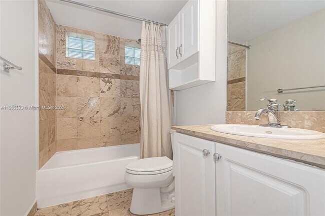 Building Photo - 7800 Collins Ave