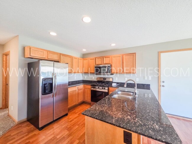 Building Photo - Urbandale Home in Waukee Schools with Office, Fireplace & 2-Car Garage