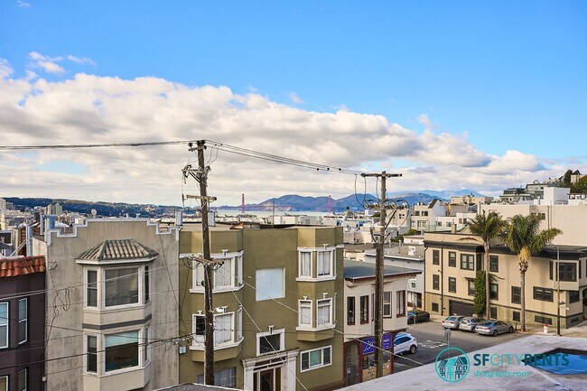 Building Photo - Russian Hill: Remodeled Top Floor Flat w/ In-Unit W/D, A/C, Private Roof Deck & Garage Parking w/...