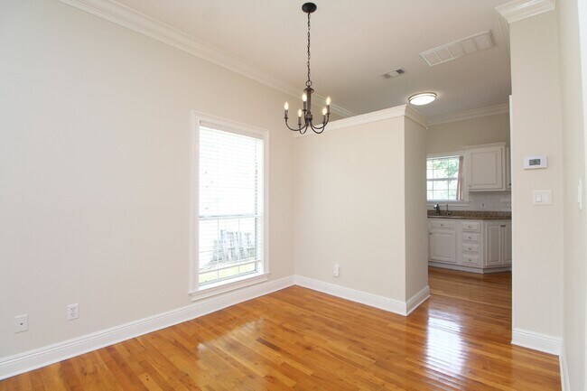 Building Photo - Charming Downtown 2BR/1BA Cottage – Hardwood Floors, Granite Kitchen, Front Porch, Fenced Backyar...