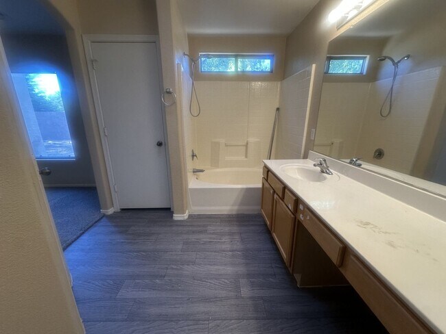 Building Photo - Rare single-level home offers 5 bedrooms and a versatile floor plan designed for comfortable living