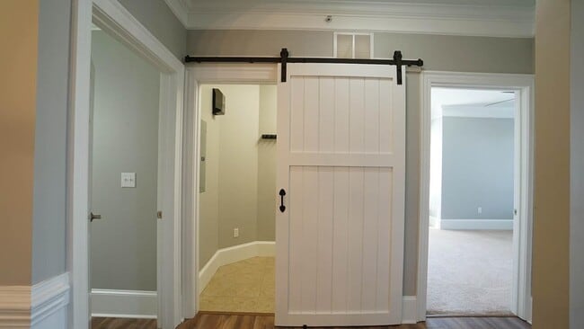 Laundry barn door - 426 Waterford Lake Dr