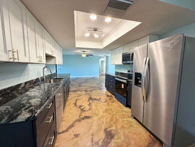 Building Photo - "Waterfront Home with Dock! 3-Bedroom Oasis with 2 Baths and 1,800 Sq Ft of Comfort in Hudson, FL!"