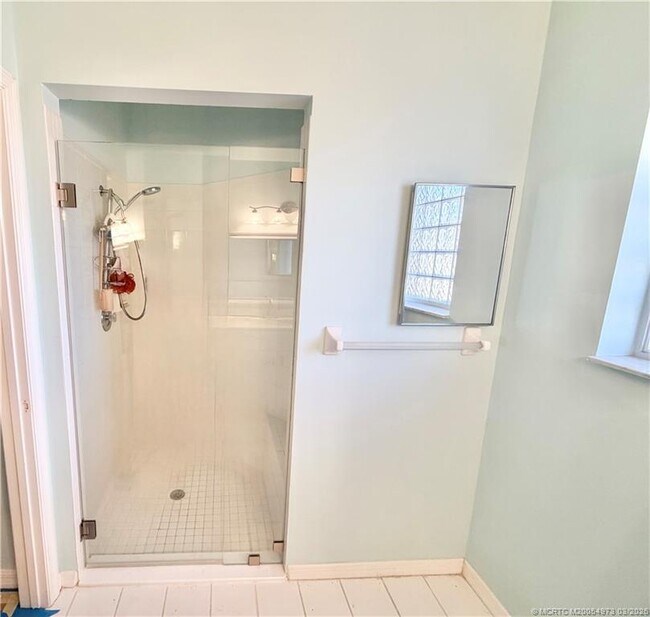 Building Photo - 3486 SW Pindo Palm Ln