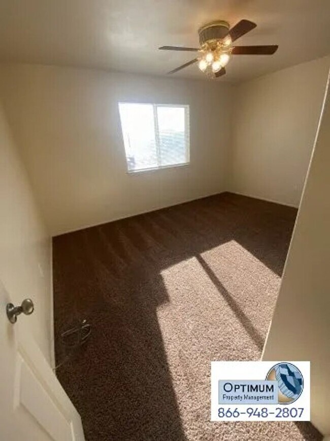 Building Photo - Spacious 4-Bedroom Home with 3-Car Garage & Downstairs Suite!