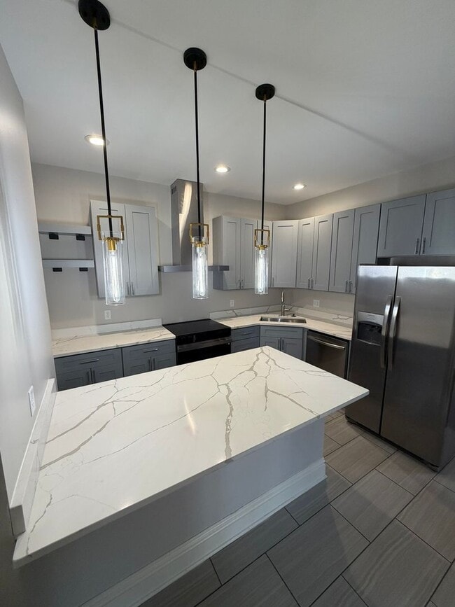 Building Photo - Bright & Spacious 3BR in The Grove – Walk to Shops & Dining!