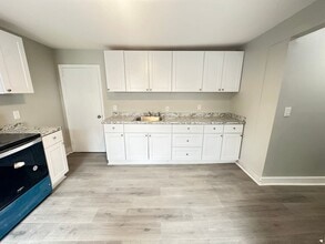 Building Photo - Renovated 4 Bedroom and 1.5 Bath