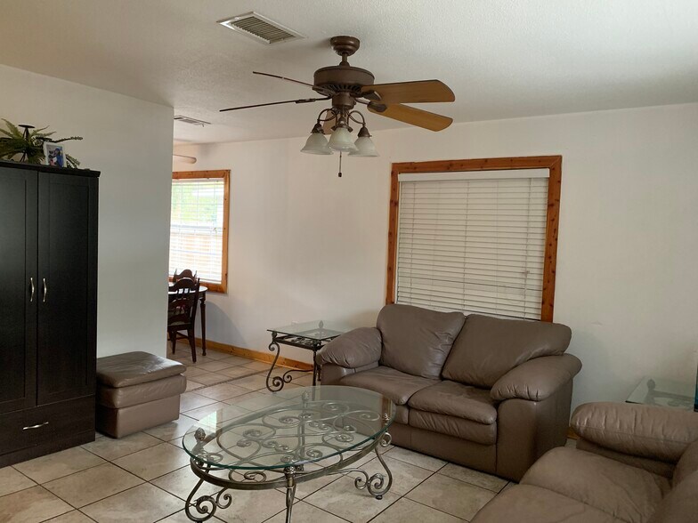 Tile flooring through the entire house. Easy for cleaning. - 4911 23RD ST W, #A