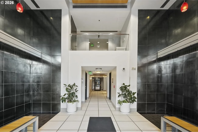 Building Photo - Exquisite Condominium at the Renowned Waterfront Pearl with Views of the River, Work Out Facility...