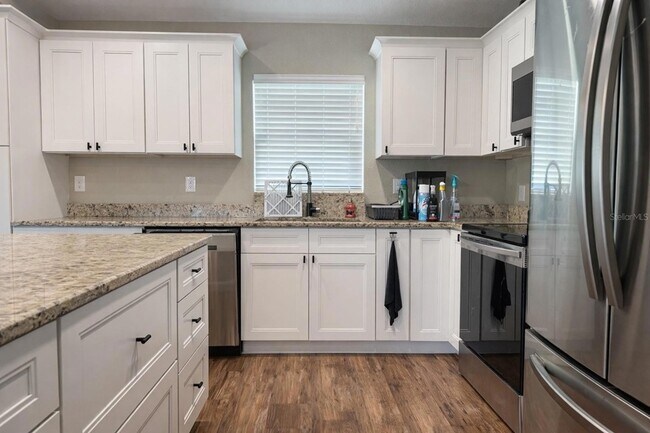 Building Photo - 5223 Kingsman Ave