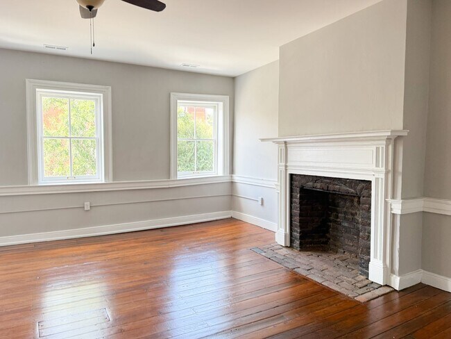 Building Photo - Renovated One-Bedroom Gem Steps from Train, Dining & Shopping