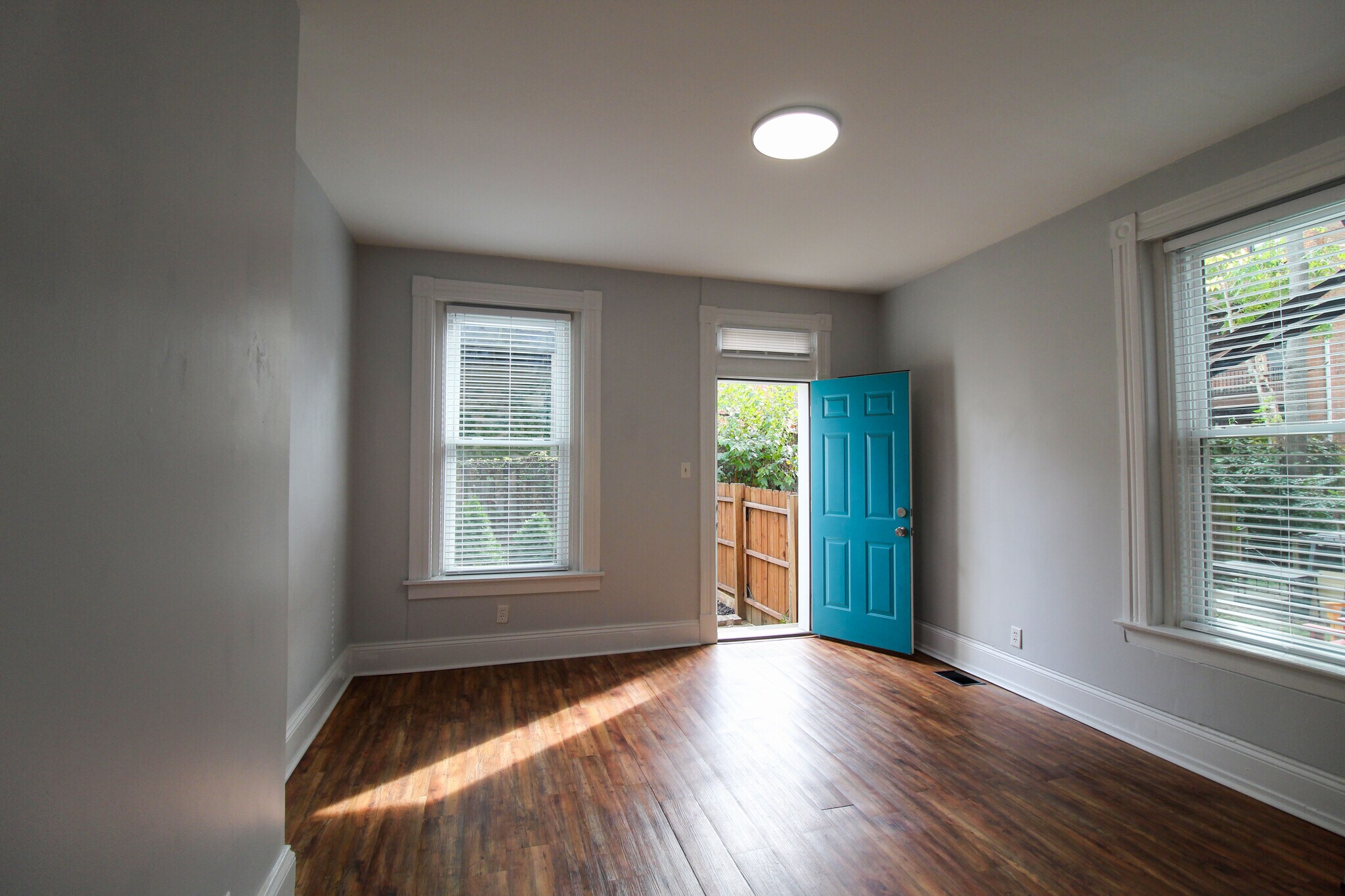 Bedroom with back door to patio - 421 Hopkins St
