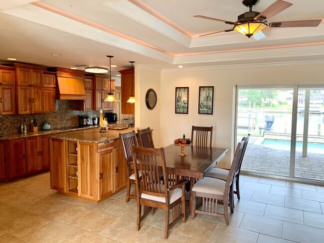 Building Photo - AVAILABLE 2027 SEASON! ! PGI HEATED POOL, WATERFRONT, BOAT LIFT