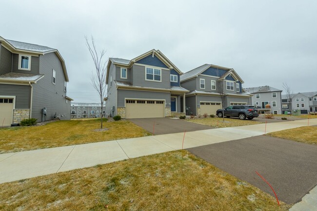Building Photo - Awesome maple grove 5 bed 4 bath townhome! Pond views, 2 years old!