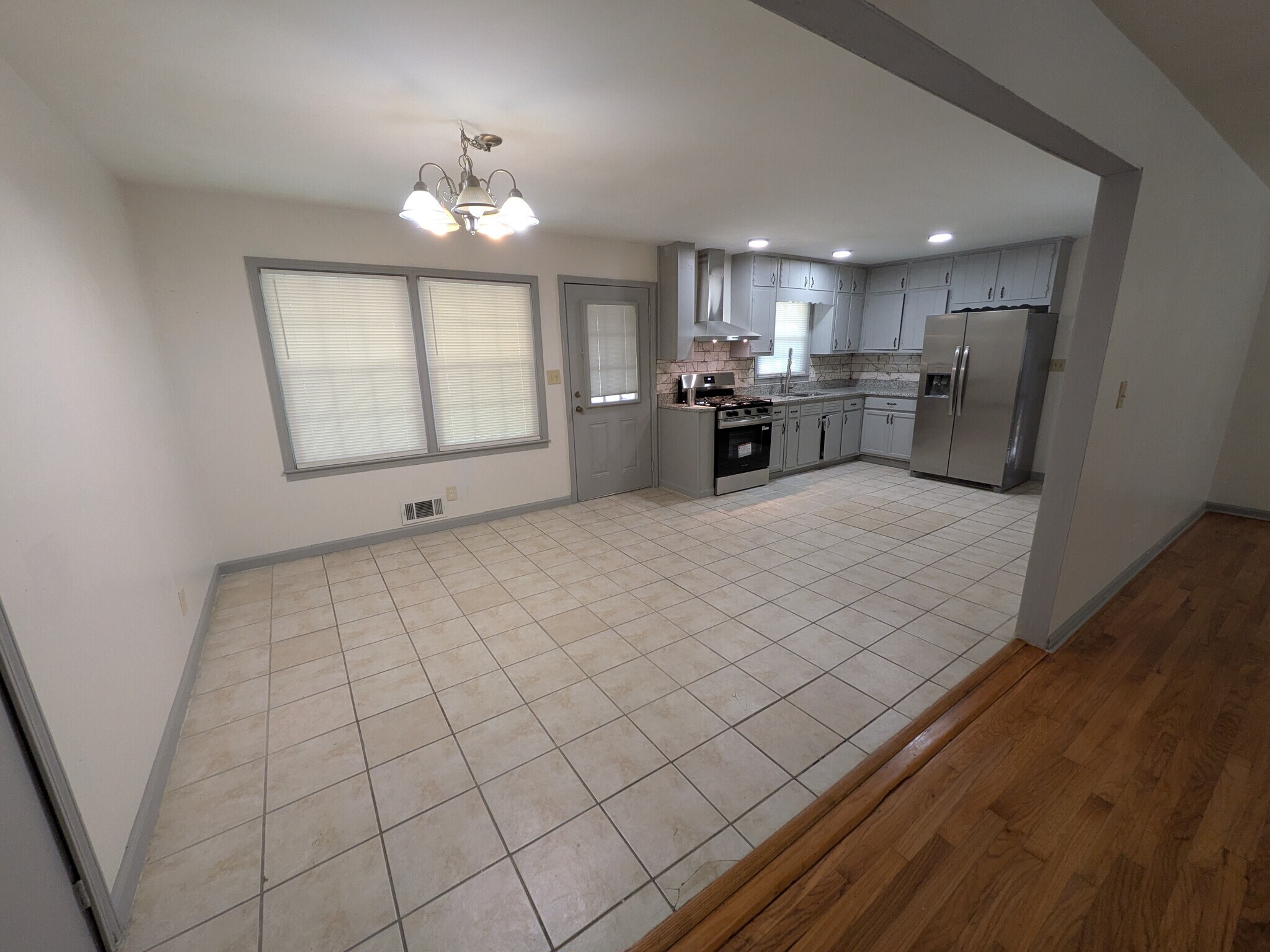 kitchen adjacent to living room - 6082 Walker Rd