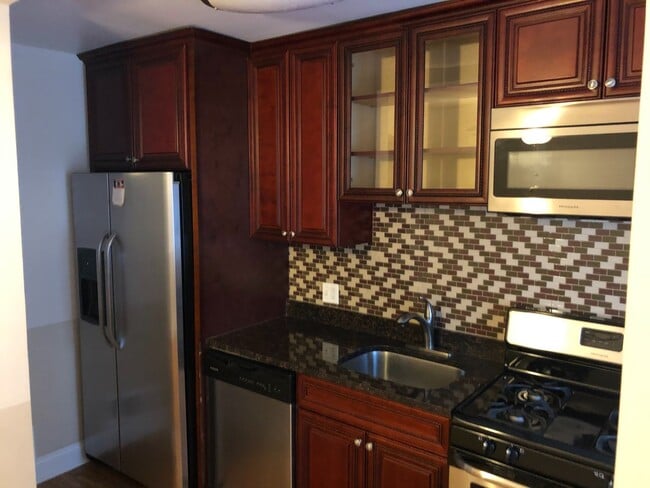 Building Photo - *COMING SOON* Beautiful, Spacious Townhome...