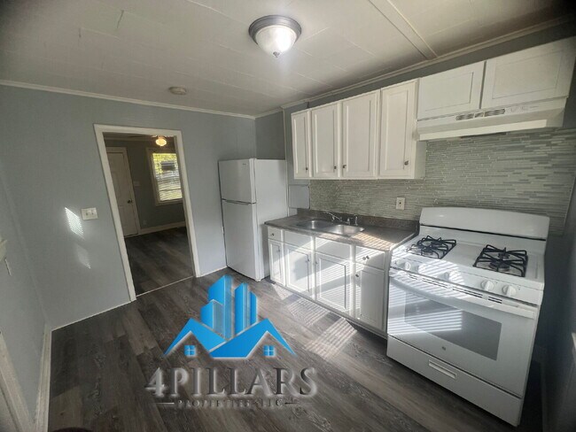 Building Photo - Charming 2 Bedroom Duplex in La Porte with Spacious Layout and Prime Location