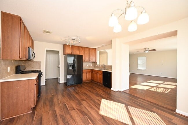 Building Photo - 9403 Coatsworth Dr
