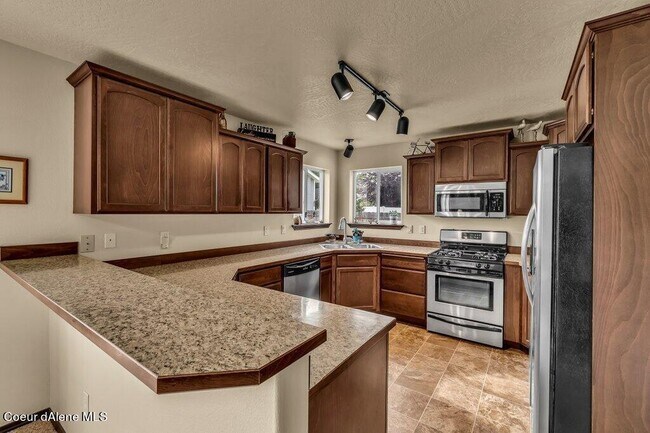 Building Photo - 8428 N Boysenberry Loop