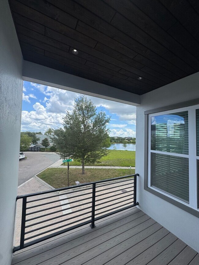 Building Photo - Lake Nona Move-In Special! Save $100/Month | 4 Bed, 3.5 Bath Laureate Park Townhome