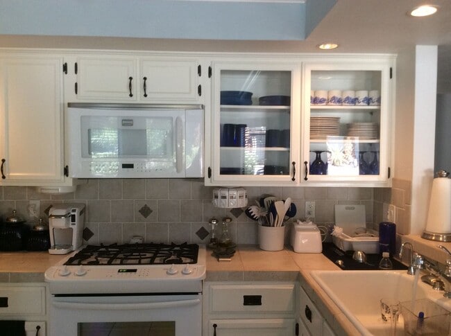 Building Photo - Stunning 2-story home offering 3 bedrooms, 2.5 bathrooms, with Pool