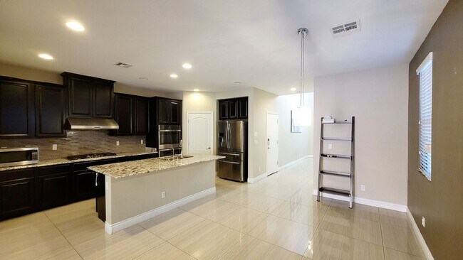 Building Photo - 7146 Flowering Rose Ave