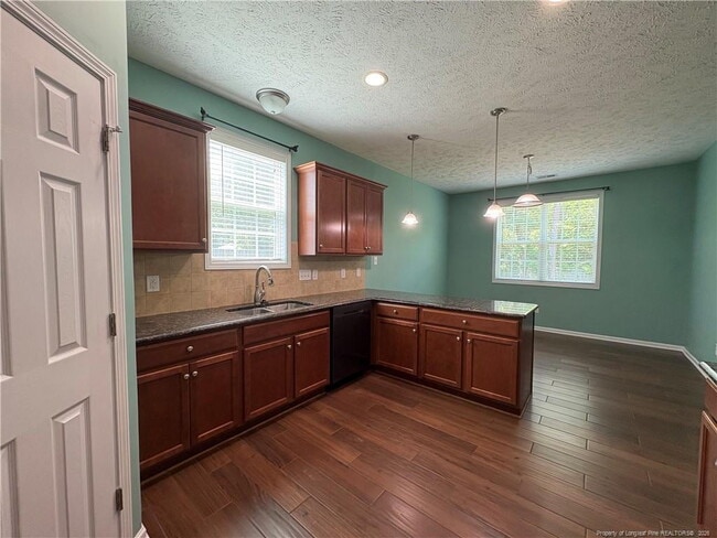 Building Photo - Experience Elegance: 4-Bedroom Gem with Granite Charm on Beaubien Drive
