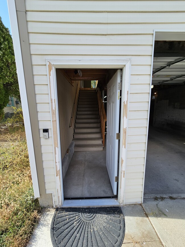 Stairs through downstairs front door - 114 S 200 E