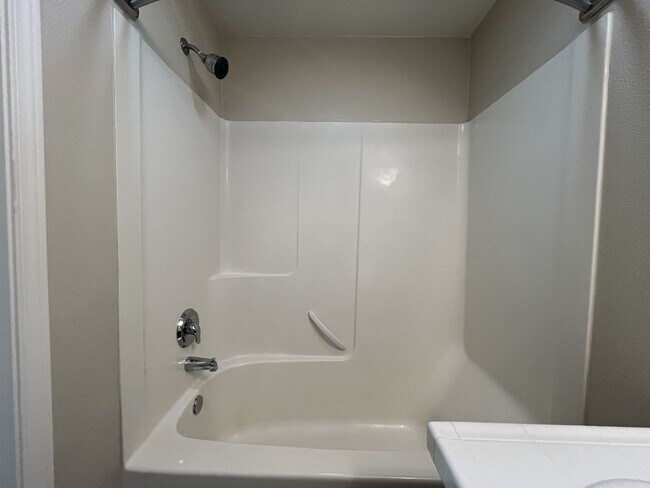 Building Photo - Inviting Two-Story 3BR Home Featuring Gas Range, Walk-In Closet, and Built-In Deck Seating