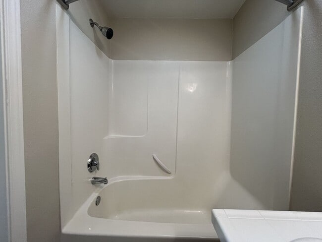 Building Photo - Inviting Two-Story 3BR Home Featuring New Carpet, New Stainless Appliances, Spacious Garage Stora...