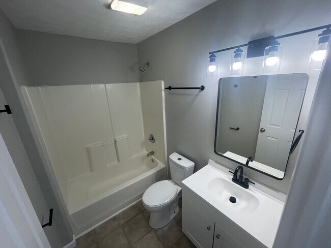 Building Photo - SUBLEASE - Three Bedroom Single Family Home with Fenced Backyard