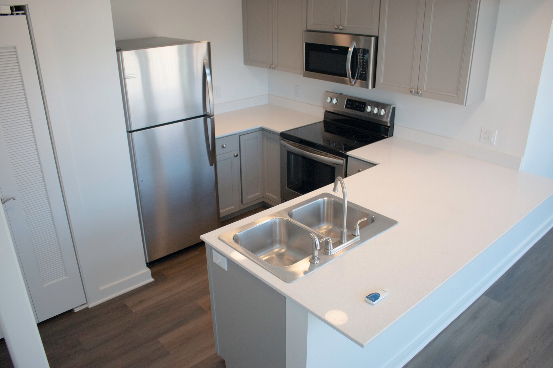 Kitchen with stainless appliances - 318 E 6th St