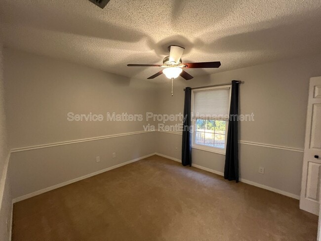 Building Photo - 6004 Players Pl