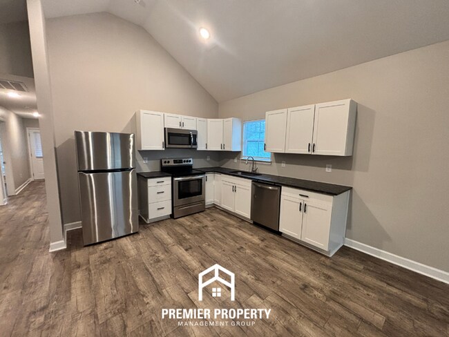 Building Photo - Charming 3BR Home with Vaulted Ceilings, Stainless Steel Kitchen & Fenced Yard in Odenville