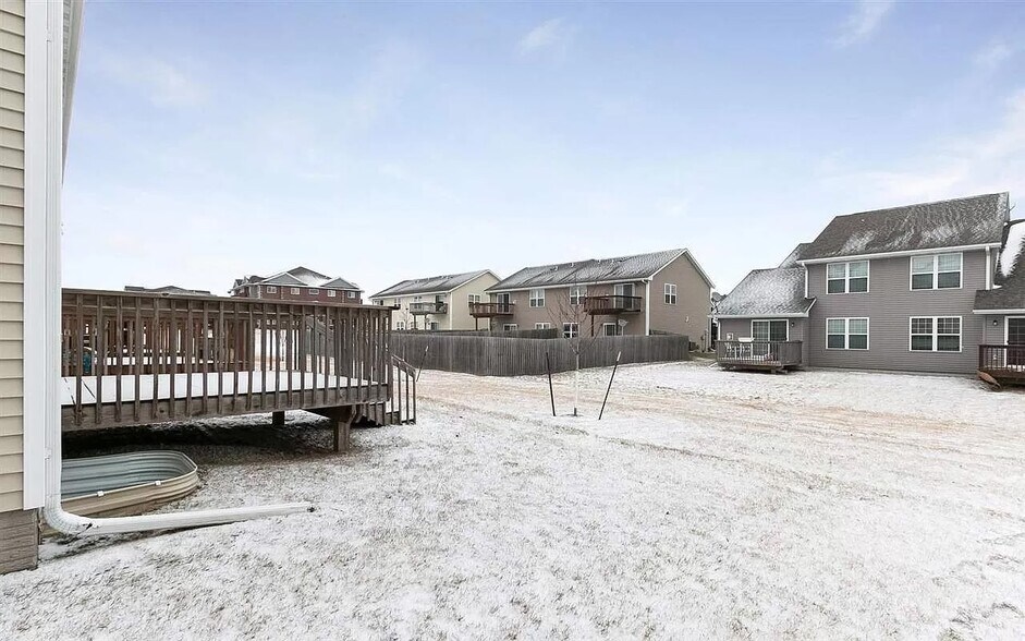Side view, overlooking shared open space and attached deck - 248 Alydar Dr
