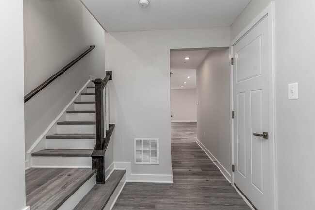 Building Photo - Townhouse with 1-Car Garage, Rooftop Deck ...