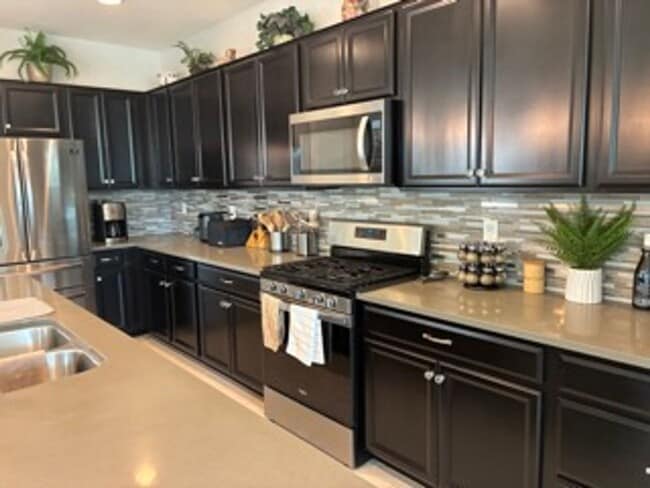 Building Photo - STUNNING NEWER HOME- GATED