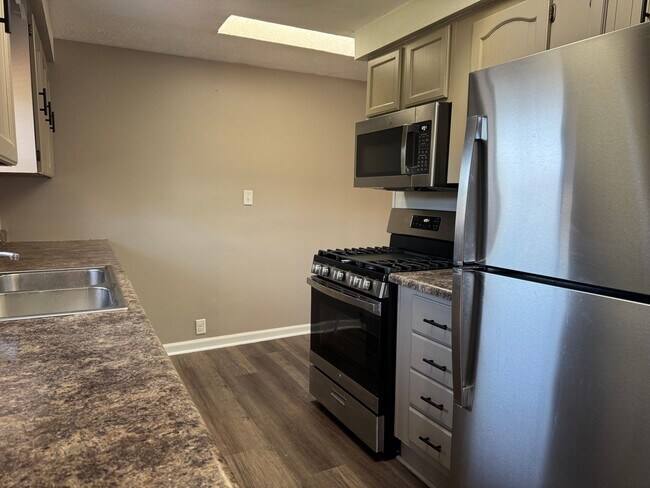 Building Photo - Bright and spacious split-entry home with a finished lower level, large yard, and plenty of updates!