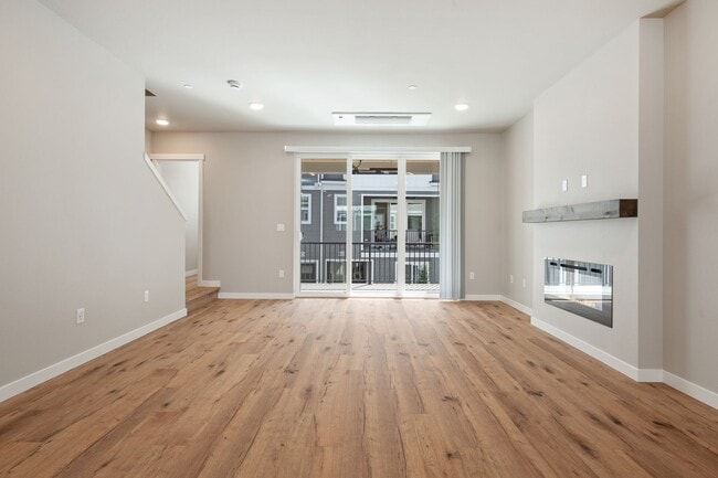 Building Photo - NEW CONSTRUCTION – Stylish 4-Bedroom Townh...
