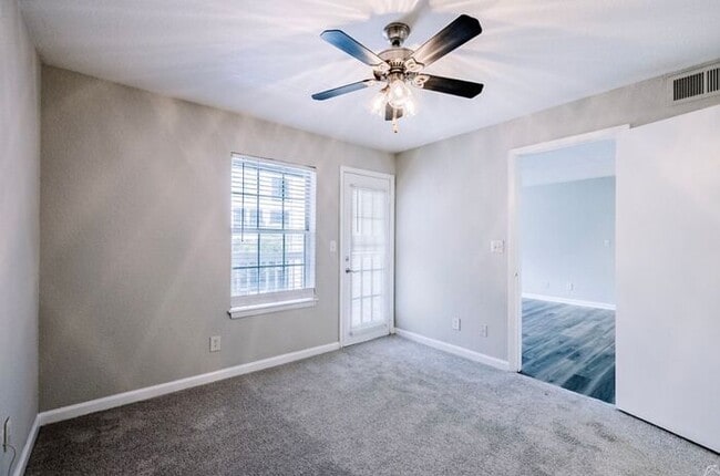 Building Photo - Spacious 2-Bedroom Elite Apartment with Private Balconies & Washer/Dryer