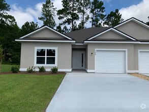 Building Photo - 3/2 with landscaping included!